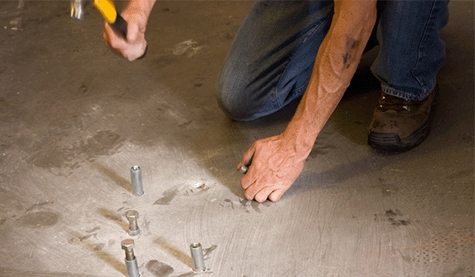 MaxJax lift installation guide, drilling and securing anchor bolts into concrete floor safely