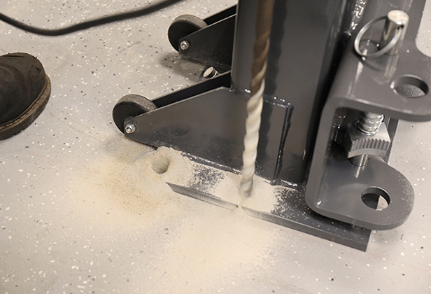 Proper installation of MaxJax requires precise drilling and securing of the baseplate with a rotary hammer drill to ensure stable column placement.