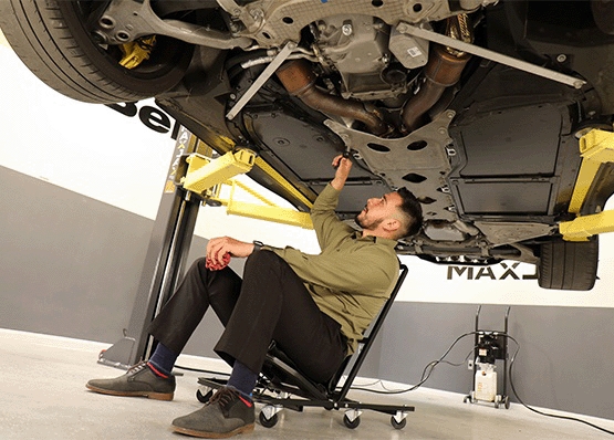 MaxJax M7K portable two-post lift saves space, perfect for low-ceiling garage storage.